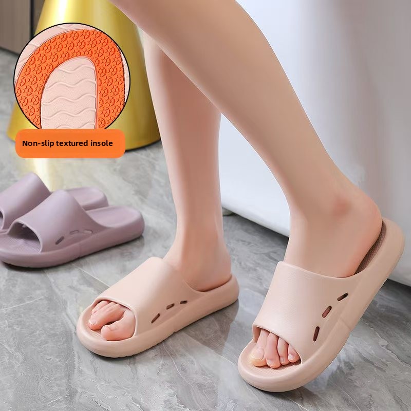 Senior using anti-slip waterproof slippers in wet bathroom